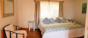 Postel nebo postele na pokoji v ubytování Pikera Uri Eco Lodge