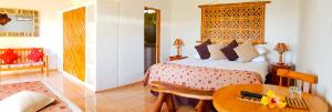 Postel nebo postele na pokoji v ubytování Pikera Uri Eco Lodge
