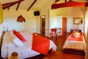 Postel nebo postele na pokoji v ubytování Pikera Uri Eco Lodge
