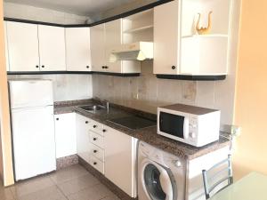 A cozinha ou cozinha compacta de Apartment on Playa Las Vistas
