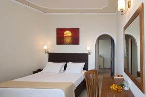 Tempat tidur dalam kamar di Hotel Kaiser Bridge