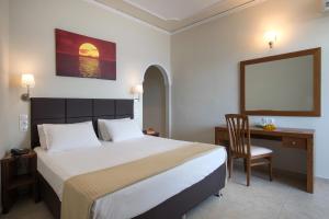 Tempat tidur dalam kamar di Hotel Kaiser Bridge