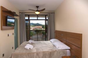 Postel nebo postele na pokoji v ubytování Hotel Casa Alfredo