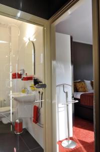 Koupelna v ubytování City Hotel Koningsvlinder + 37 fotografií