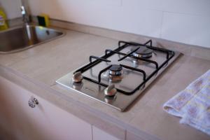 A kitchen or kitchenette at Cabañas La Luz