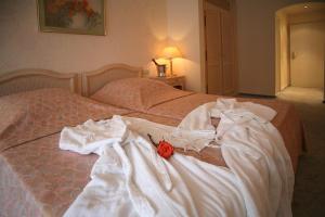 Letto o letti in una camera di Hotel Meyer