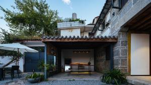 Φωτογραφία από το άλμπουμ του Ting Jian Empty Yard Pastoral Design Residential Dali Shop σε Νταλί