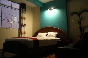 Hotel Camino Real客房内的一张或多张床位