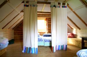 Postel nebo postele na pokoji v ubytování Järvenukka Puhkemaja