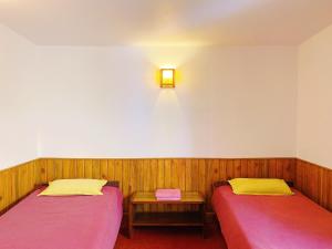 Voodi või voodid majutusasutuse Swayambhu View Guest House toas