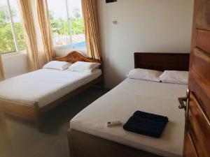 Krevet ili kreveti u jedinici u okviru objekta Hotel Tobiko