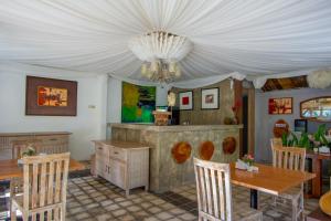 Bali Komang Guest House Sanur的休息区