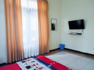 Fotografie z fotogalerie ubytování Green Surabaya Homey Syariah v destinaci Surabaja + 66 fotografií