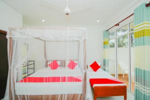 Llit o llits en una habitació de Onaro Beach View