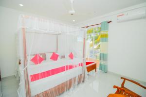Llit o llits en una habitació de Onaro Beach View