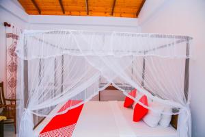 Llit o llits en una habitació de Onaro Beach View