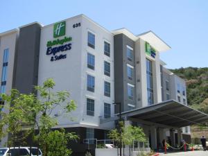 a rendering of the exterior of a hotel at Holiday Inn Express & Suites San Diego - Mission Valley by IHG in San Diego