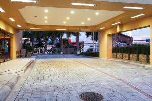 a large empty courtyard in a building at Holiday Inn San Salvador, an IHG Hotel in San Salvador