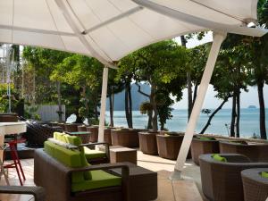 Ein Restaurant oder anderes Speiselokal in der Unterkunft Aonang Villa Resort - SHA Extra Plus 