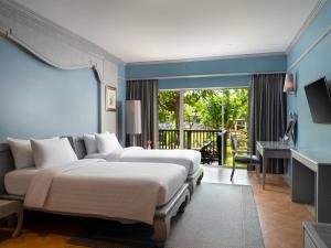 Кровать или кровати в номере Aonang Villa Resort I Beach Front