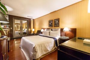 Letto o letti in una camera di Love Tree Motel
