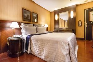 Letto o letti in una camera di Love Tree Motel
