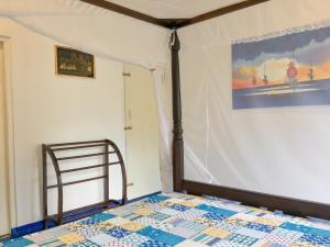 Un pat sau paturi într-o cameră la SIlvas Surf Home