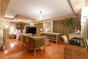 TV o dispositivi per l'intrattenimento presso Love Tree Motel