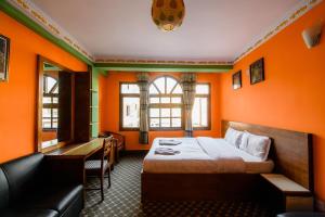Кровать или кровати в номере Hotel Pomelo House