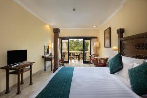 Postel nebo postele na pokoji v ubytování Ayung Resort Ubud