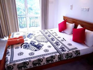 Un pat sau paturi într-o cameră la Jaye's Homestay