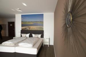 Postel nebo postele na pokoji v ubytování Hotel absolute