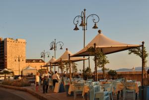 En restaurang eller annat matställe på Centro storico via Sassari Accommodation