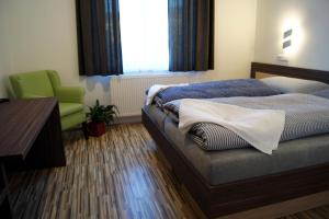 Postel nebo postele na pokoji v ubytování Penzion Ranch