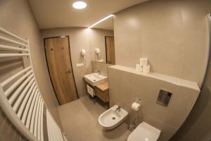 Vannituba majutusasutuses Resort Orsino