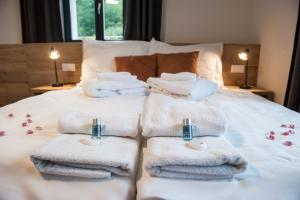 Voodi või voodid majutusasutuse Resort Orsino toas