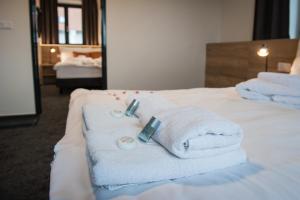 Voodi või voodid majutusasutuse Resort Orsino toas