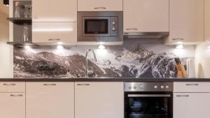 Kuchyň nebo kuchyňský kout v ubytování Mountain Apart Oetztal
