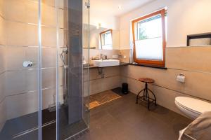 Koupelna v ubytování Ferien-Lodge Lindau - Private Sauna & nah am See + 15 fotografií
