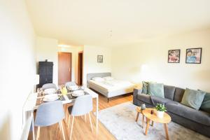 Et opholdsområde på Charming and comfortable studio ideally located in Saillon
