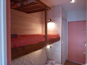 Poschodová posteľ alebo postele v izbe v ubytovaní CHENONCEAU II 168