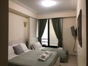 A bed or beds in a room at Visconti apartment.