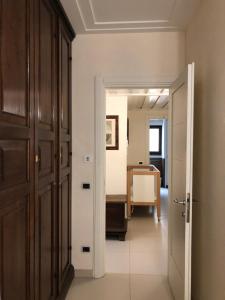 A bed or beds in a room at Visconti apartment.