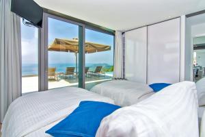 Fotografia z galérie ubytovania Luxury Glass Villas v destinácii Syvota