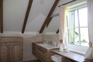a bathroom with a sink and a window at Villa Salis in Altaussee +75 photos