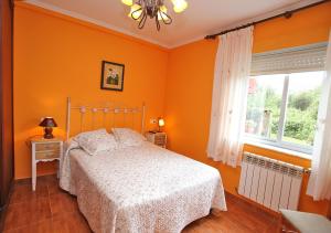Кровать или кровати в номере Pensión Casa Elena