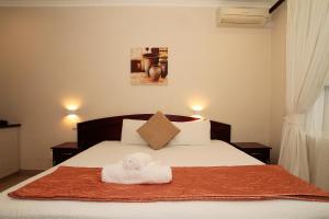 Ένα ή περισσότερα κρεβάτια σε δωμάτιο στο Addis Bed and Breakfast