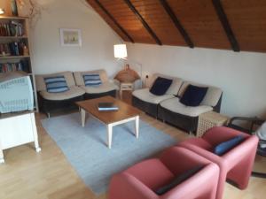 Posezení v ubytování Vakantiehuis Reuzengebergte