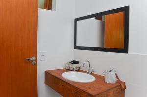 Ванная комната в Pousada la Boheme Guarda do Embaú - SC