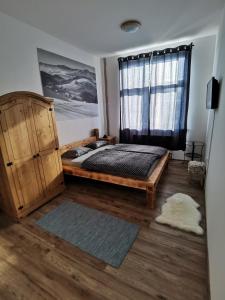 Posteľ alebo postele v izbe v ubytovaní Penzion Loučka Bystřice